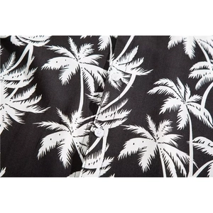 Men's Hawaiian short sleeve shirt with white palm tree prints and button-down detail
