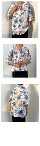 Detail of tropical floral print on a retro Hawaiian shirt with Cuban collar and loose fit