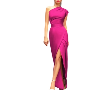 Elegant fuchsia one shoulder evening dress with high slit and pleated waist design