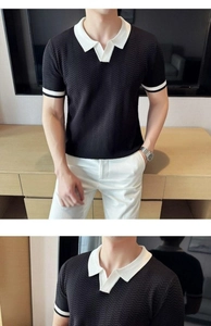 Detail of herringbone knit polo shirt with white contrast collar and ribbed texture