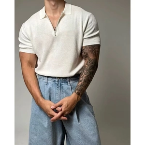 Slim fit men's white knitted polo shirt with half-zipper collar and ribbed cuffs