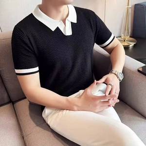 Slim fit men's knitted black polo shirt with white contrast collar and striped cuffs