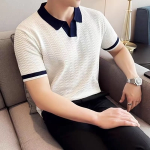 Slim fit men's knitted white polo shirt with navy blue collar and chevron texture