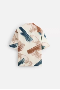 Detailed back view of a summer retro oversized shirt featuring abstract oil painting patterns