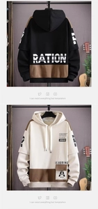 Détail de sweats à capuche color-block avec imprimé urbain et design à épaules tombantes