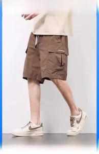 Detail view of men's brown cargo shorts with ice silk cooling fabric and drawstring waist