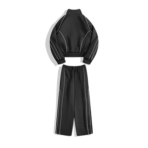 Survêtement homme noir minimaliste avec passepoil blanc et pantalon à jambes larges