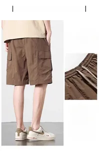 Detail of men's brown ice silk shorts showing elastic drawstring waist and loose side pocket