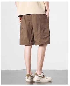 Rear view of men's cargo shorts showing the loose fit and large utility pockets