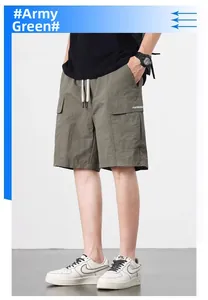 Detail of army green cargo shorts with elastic drawstring waist and side flap pockets