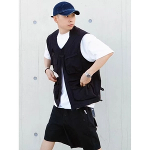 Men's retro black multi-pocket utility vest in durable nylon with relaxed fit