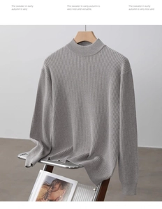 Detail of grey ribbed knit texture and mock neck collar on a men sweater