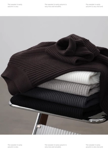 Close-up of vertical ribbed knit texture showing multiple colors of men's turtleneck sweaters
