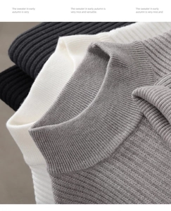 Detail of ribbed knit texture on high-neck sweaters in grey, white, and black colors