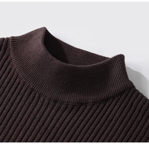 Close-up of a dark brown mock neck sweater featuring a fine vertical ribbed knit texture