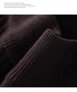 Macro view of the ribbed knit fabric texture on a premium brown winter sweater