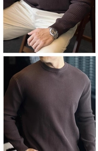 Detailed view of dark brown vertical ribbed knit fabric and classic crew neck on men sweater