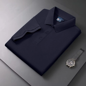 Premium navy blue cotton polo shirt with classic collar and ribbed cuffs in flat lay view