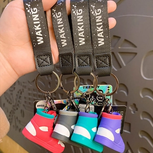Graffiti style sneaker keychain set with WAKING wrist strap in four vibrant colors