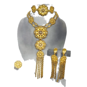 Exquisite 24k gold floral Ethiopian jewelry set including necklace, bracelet, and earrings