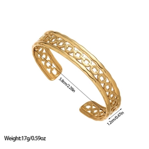 Detail view of gold stainless steel open bangle with size dimensions and weight info