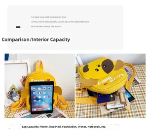 Detail view of yellow canvas toddler backpack showing internal capacity for iPad and snacks
