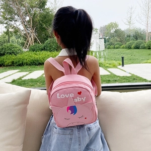 Pink canvas toddler backpack with unicorn print and Love Baby text for girls