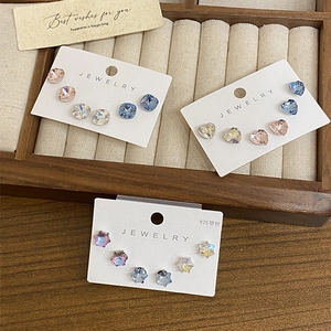 Detail of 925 silver needle stud earring sets with colorful geometric zircon crystals