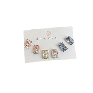 Set of six shimmering rectangular geometric stud earrings in iridescent and light blue
