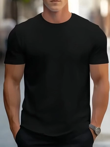 Close-up of minimalist black crewneck t-shirt fabric and classic neckline on male model