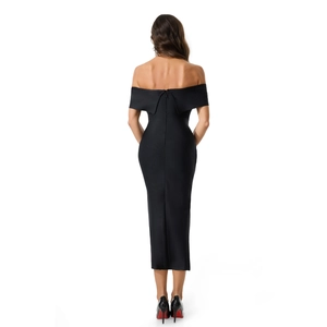 Detail of invisible zipper closure on the back of a slim fit black off-shoulder dress