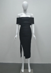 Detail view of the sleek waist pleats and side slit on this off-shoulder black dress