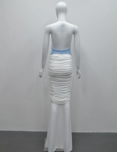 Detail of light blue backless halter top and white mermaid skirt with tiered pleats