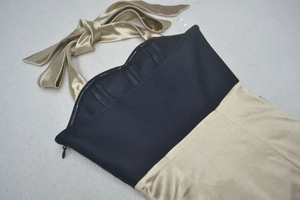 Détail de robe dos nu avec baleines de maintien et fermeture éclair latérale invisible