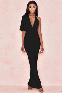Detail of elegant black bandage dress featuring deep V-neck and asymmetric cape sleeve