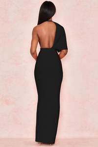 Detail of elegant black backless bandage evening gown with unique asymmetrical draped sleeve