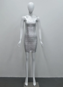 Detail of silver bandage party dress showing metallic finish and sleeveless bodycon fit
