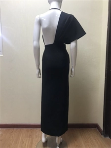 Detailed back view of a black one-shoulder bandage evening gown with an open back design