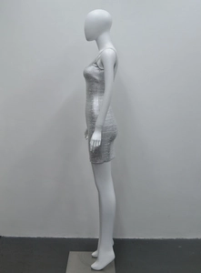 Close-up of silver metallic bodycon dress featuring horizontal textured fabric finish