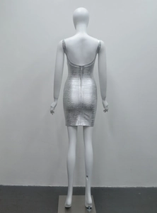 Macro detail of silver bandage dress with metallic finish and hidden back zipper