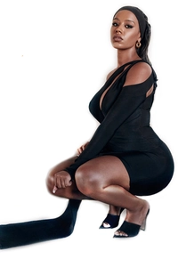 Detail of black one-shoulder hollow bandage dress showing cutout sleeve and slim fit design