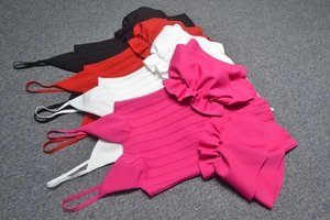 Detail of multi-layer ruffles on bandage dress in black red white and rose red colors