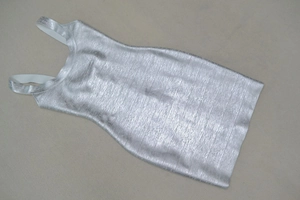 Macro shot of silver metallic bandage dress fabric texture and horizontal weave details