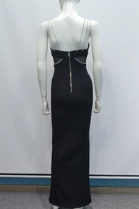 Dettaglio retro abito da sera con spalline di strass, inserti in rete e zip in metallo