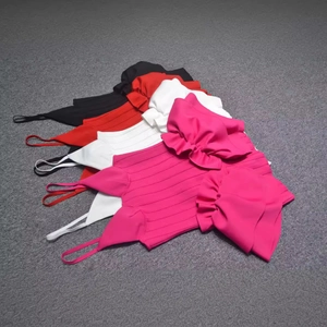 Sleeveless ruffled ribbed knit tank top in four vibrant colors with layered flounces