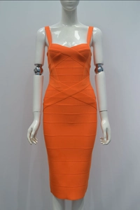 Detail of an orange bandage dress showing the ribbed texture and sweetheart neckline