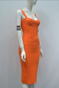 Detail view of tight orange bandage bodycon dress featuring horizontal ribbed texture