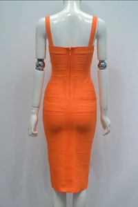 Detailed back view of orange bandage bodycon dress featuring a sleek rear zipper closure