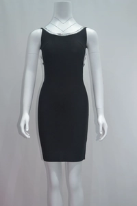 Close-up of elegant black bandage dress featuring a silver sequin embellished neckline