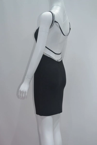 Close-up of backless sexy black bandage dress with luxury silver rhinestone trim detailing